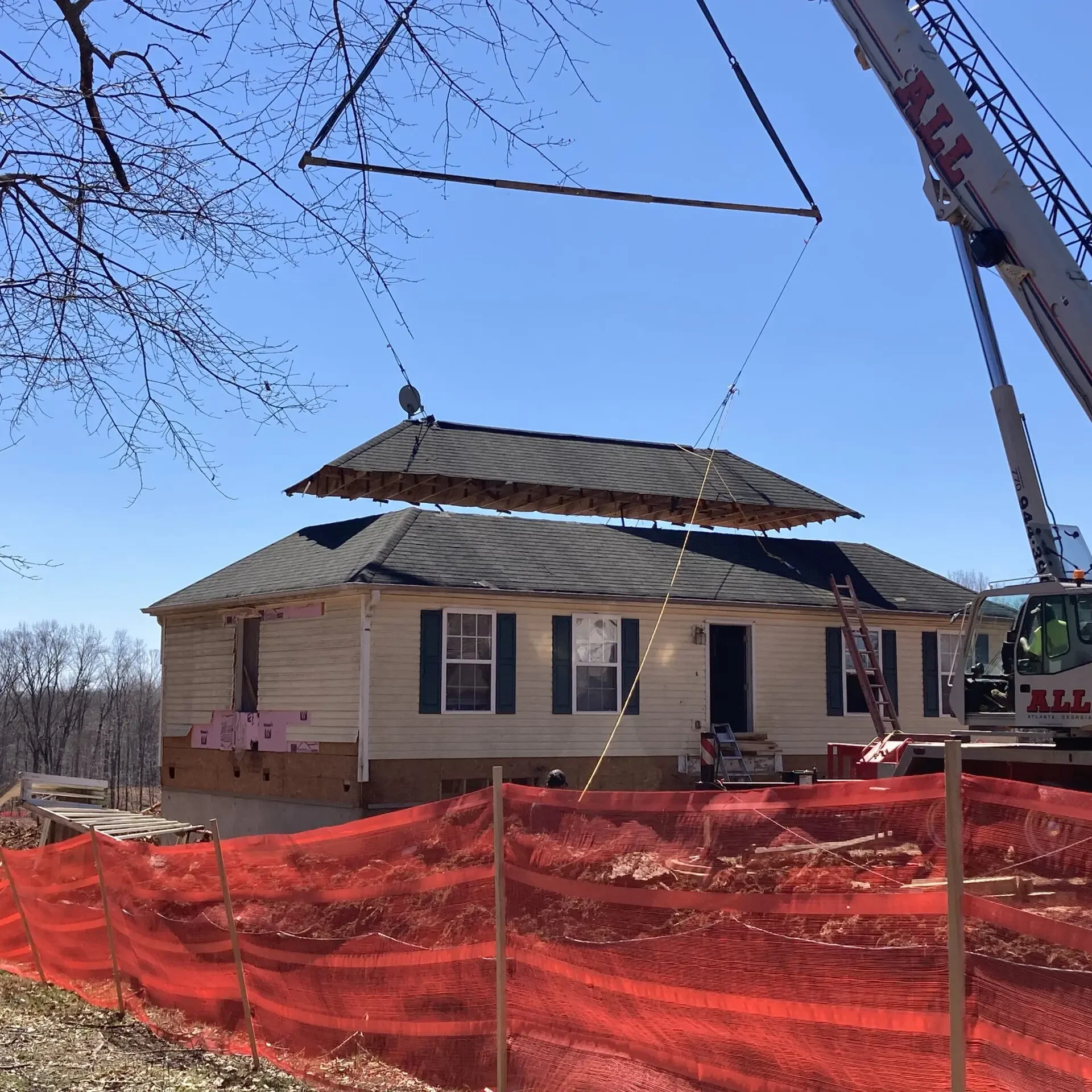 House with roof preparation for move.