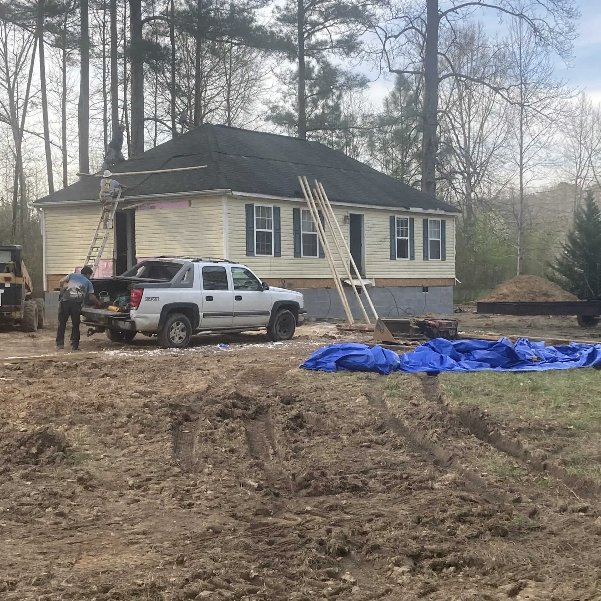 House being put back together after move.